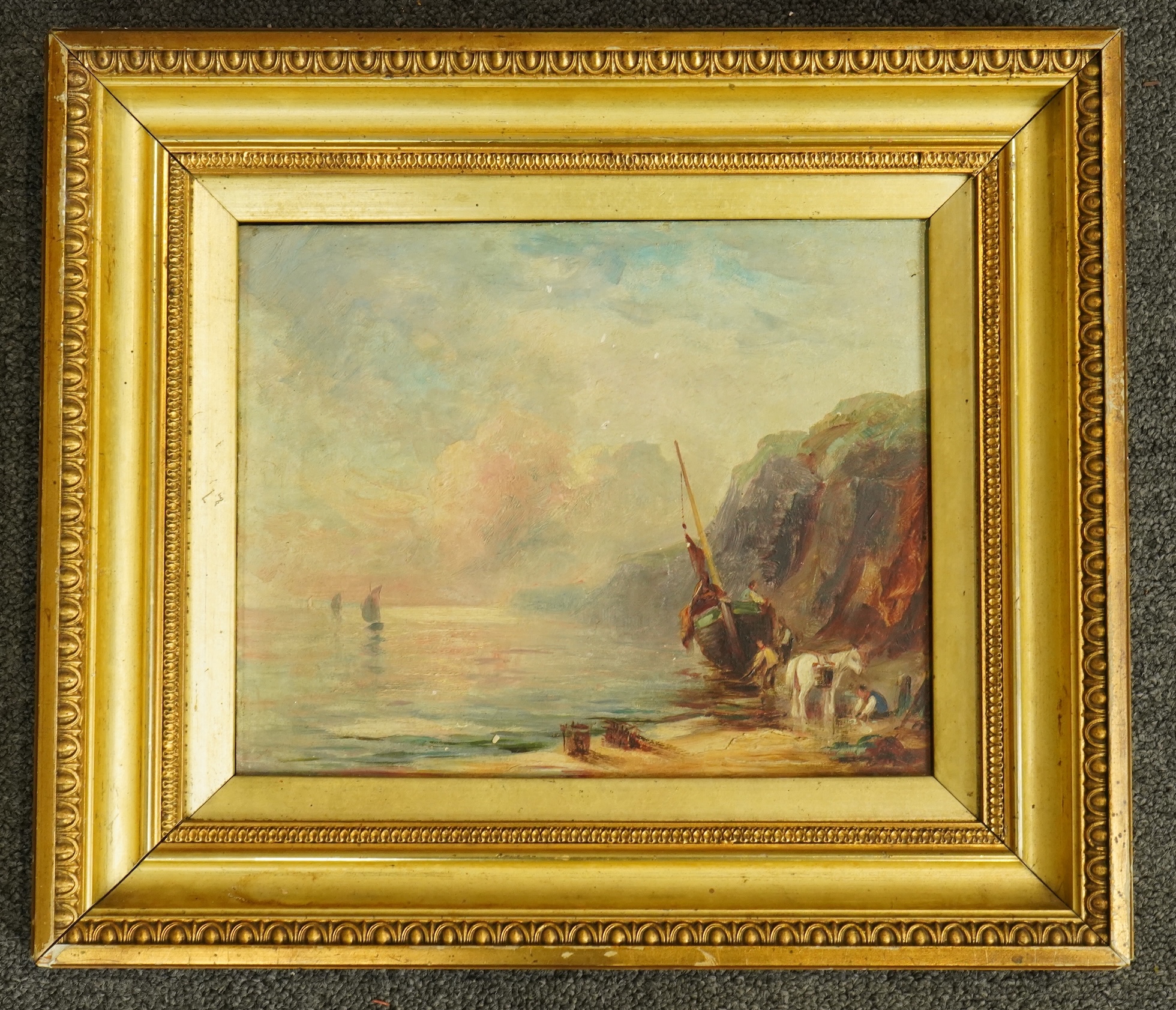 Late 19th century, English School, oil on panel, Coastal scene with beached fishing boat and figures, unsigned, 20 x 25cm, gilt framed. Condition - fair to good